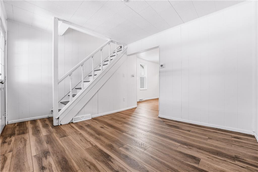 315 Mitchell Avenue Butler, PA 16001 - Photo 5 of 19 a view of entryway and hall with wooden floor