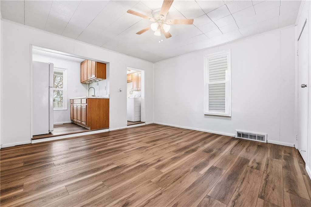 315 Mitchell Avenue Butler, PA 16001 - Photo 9 of 19 a view of empty room with wooden floor and fan
