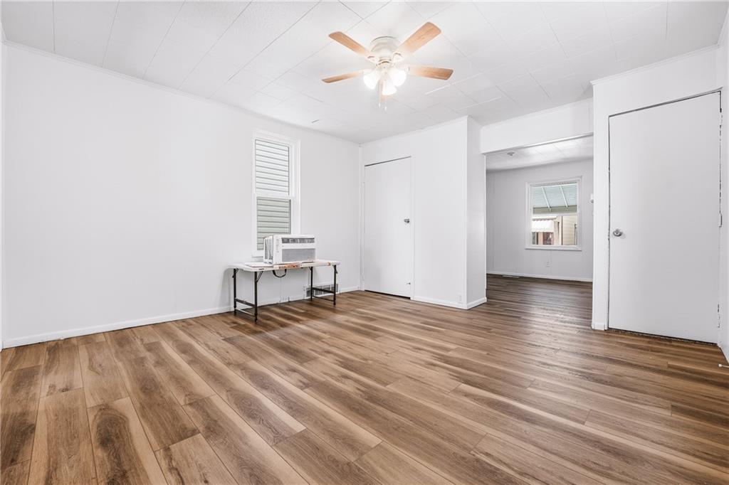 315 Mitchell Avenue Butler, PA 16001 - Photo 10 of 19 a view of empty room with wooden floor