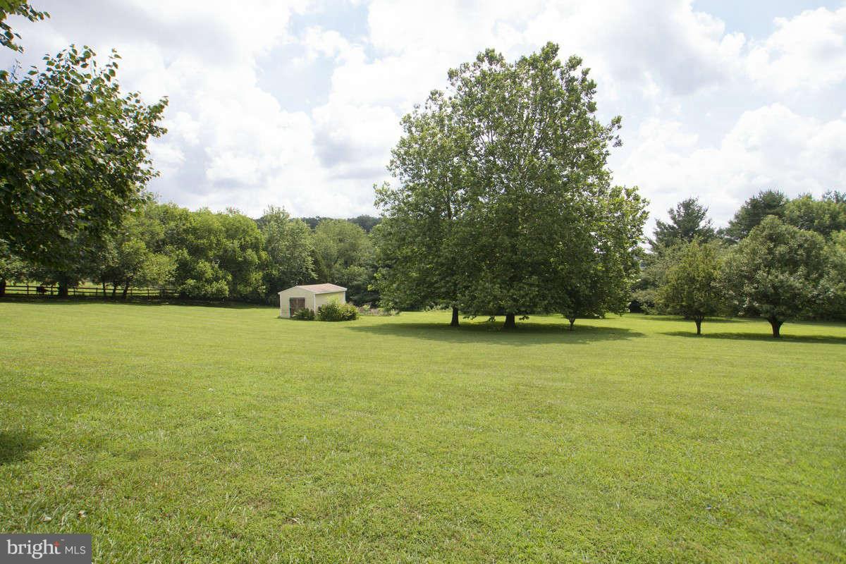 21107 Gunpowder Road Manchester, MD 21102 - Photo 28 of 30 a front view of a house with a garden