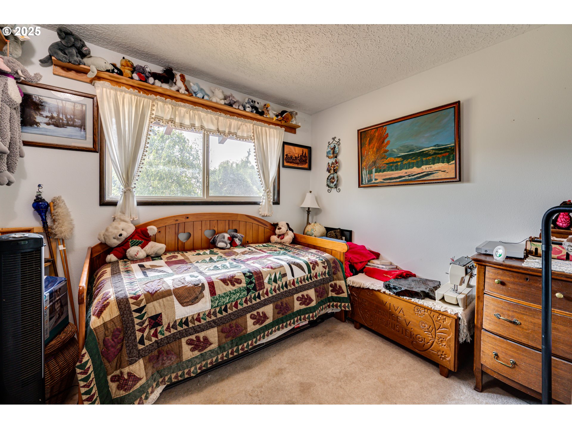 1415 Cloverdale Road Kalama, WA 98625 - Photo 18 of 39 a bedroom with a bed and a window