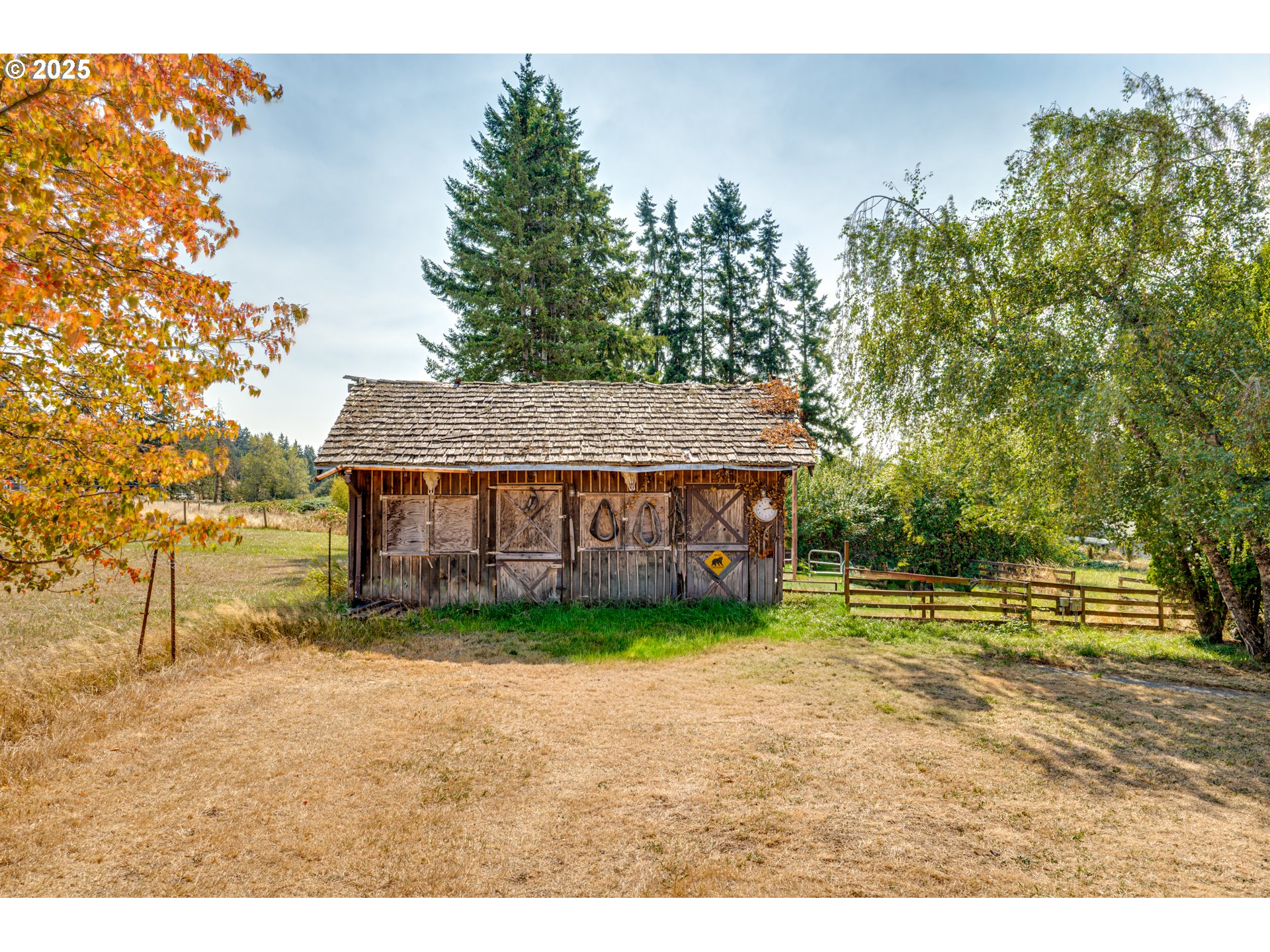 1415 Cloverdale Road Kalama, WA 98625 - Photo 30 of 39 a view of a yard in front of a house with a large tree