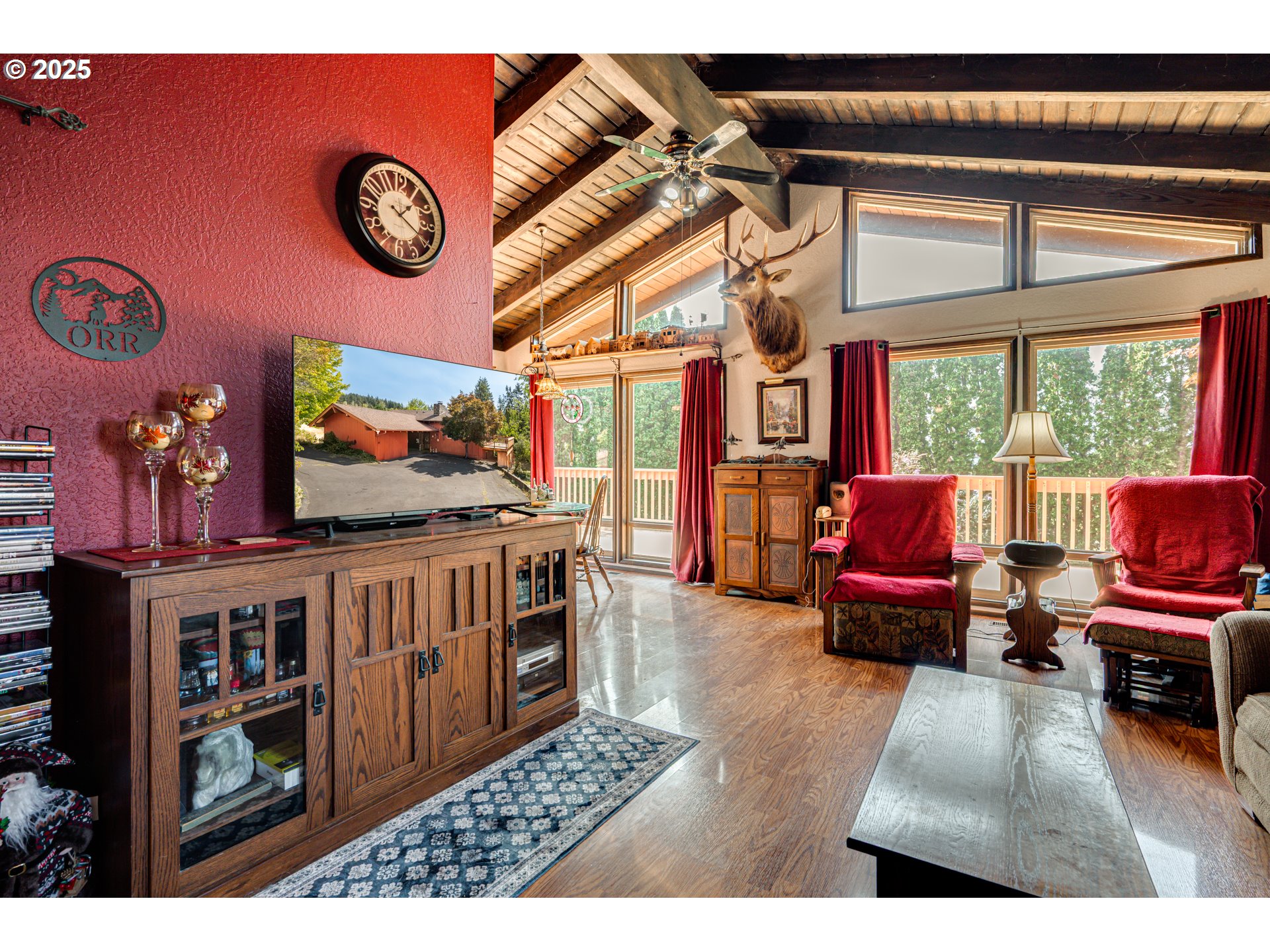 1415 Cloverdale Road Kalama, WA 98625 - Photo 4 of 39 a living room with furniture and a flat screen tv
