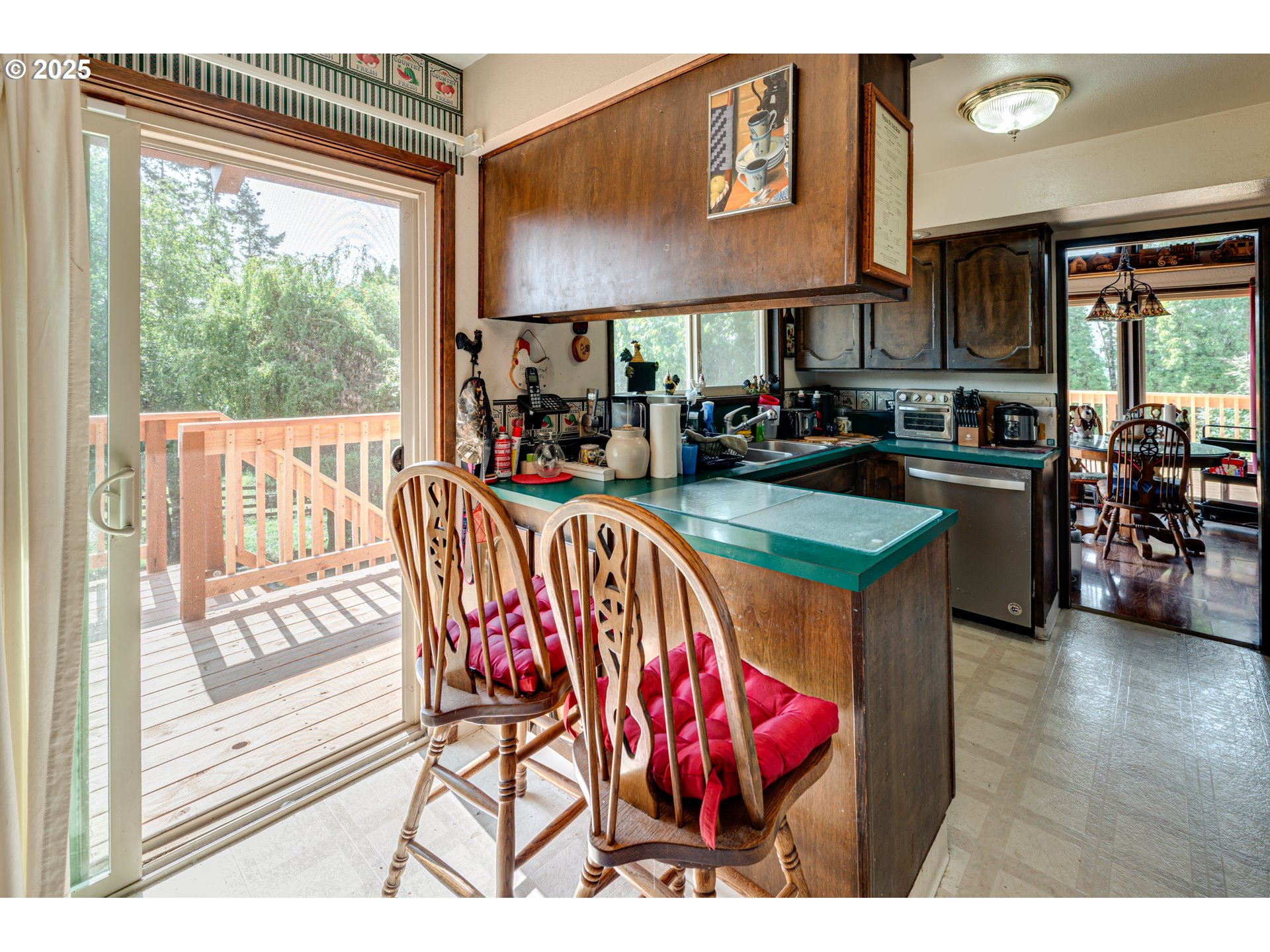 1415 Cloverdale Road Kalama, WA 98625 - Photo 8 of 39 a view of a dining room with furniture window and outside view