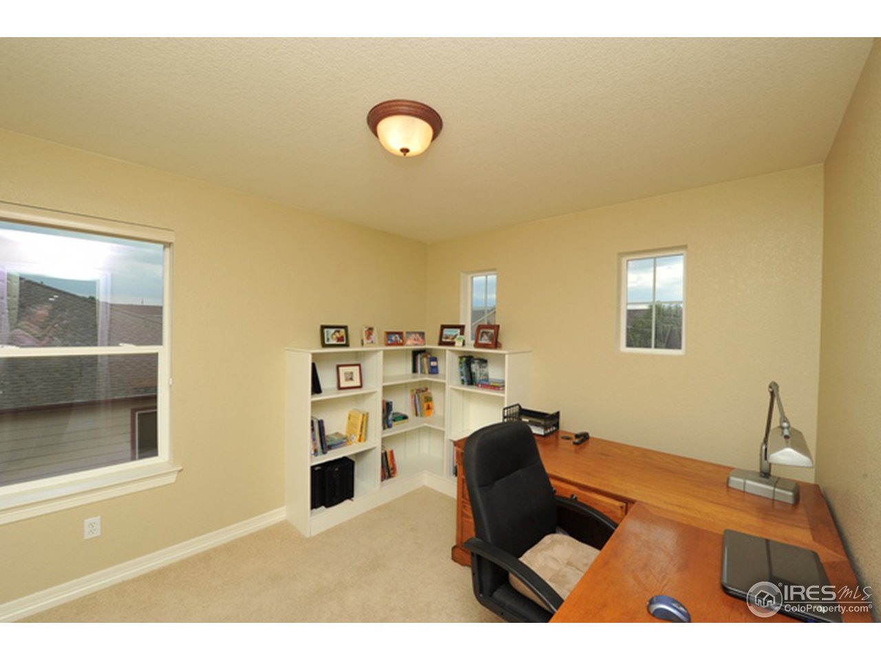 609 Americana Road Longmont, CO 80504 - Photo 18 of 25 3rd upstairs bedroom