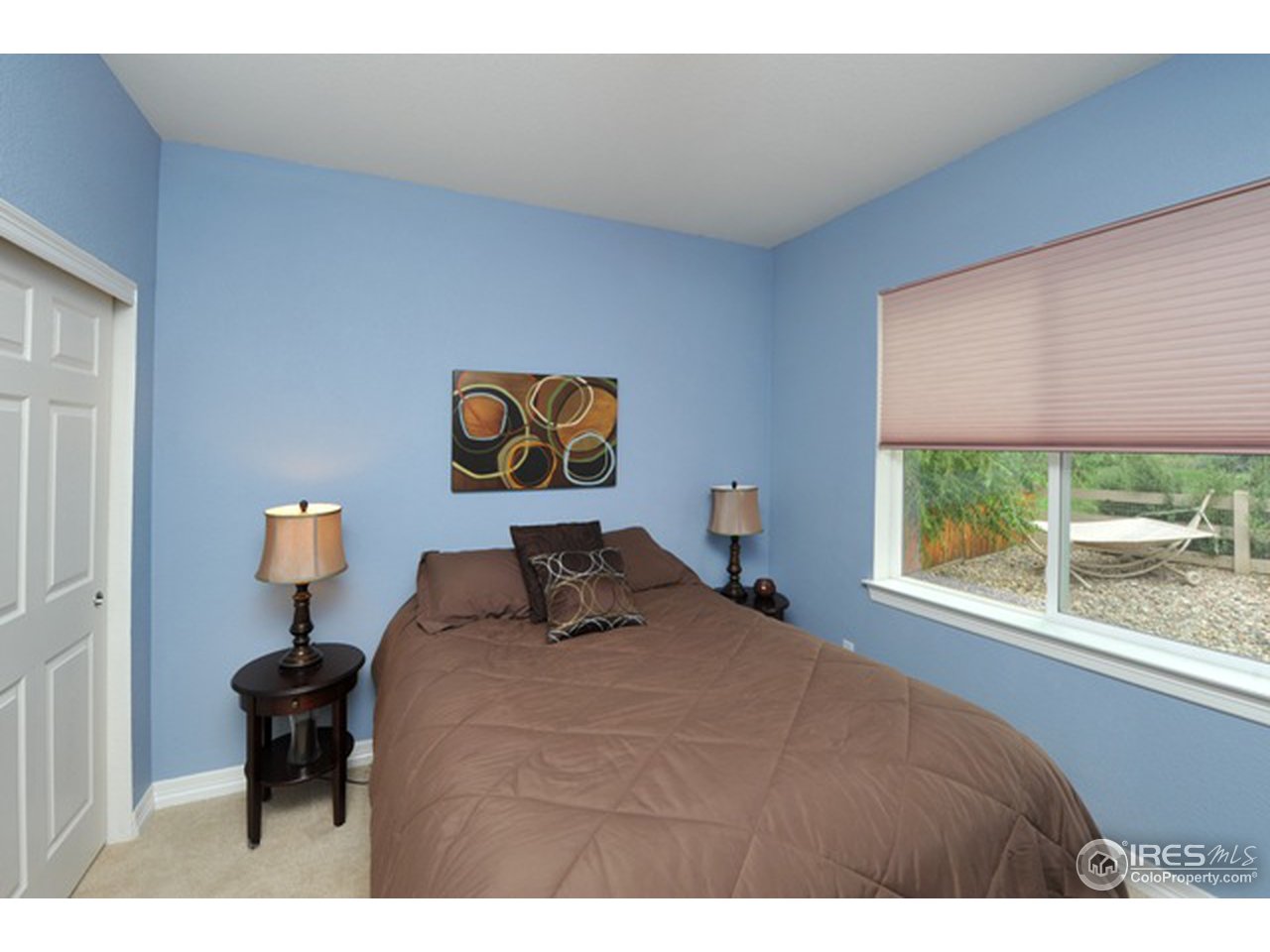 609 Americana Road Longmont, CO 80504 - Photo 10 of 25 main level bedroom
