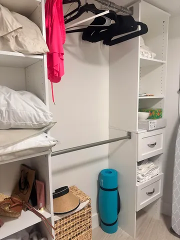 a bathroom with a shower and a sink