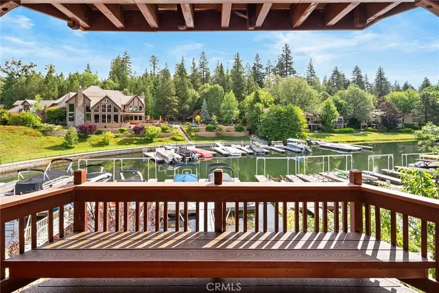 a view of a dining room with furniture wooden floor and chandelier