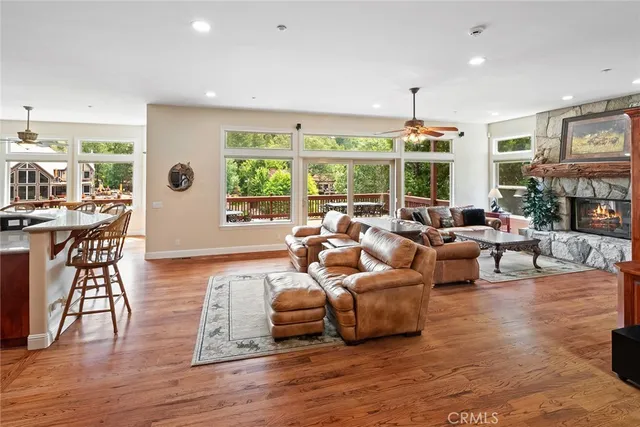 a view of living room with furniture and garden view