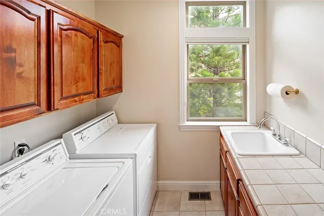 a bedroom with a bed and a cabinets