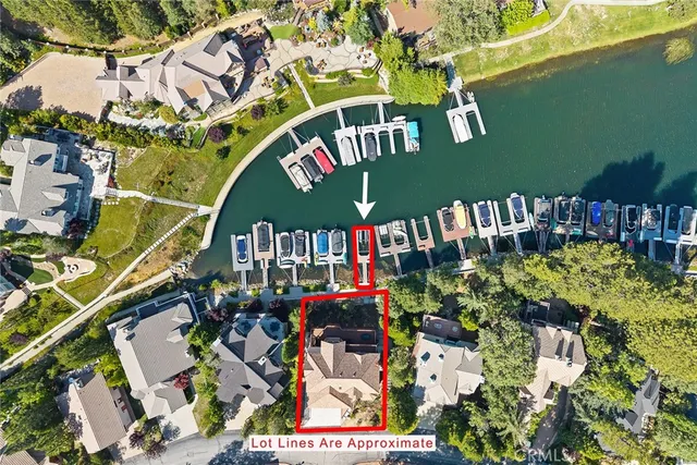 a view of swimming pool with chairs and wooden floor