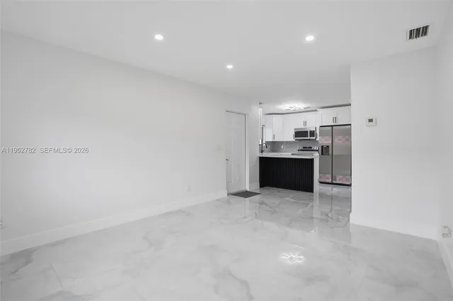a view of a bathroom with shower