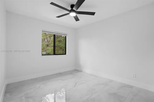 a kitchen with a sink stainless steel appliances and cabinets