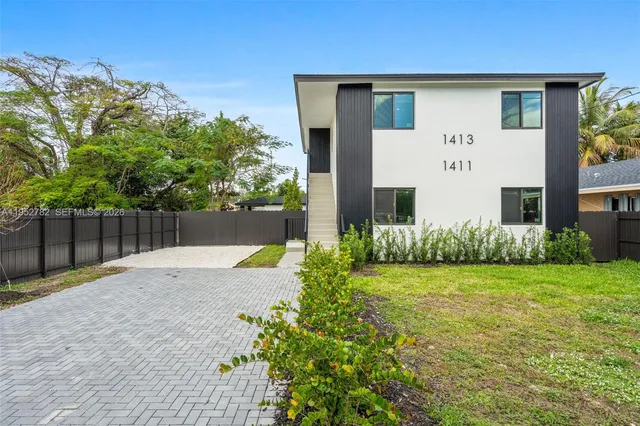 a front view of a house having yard