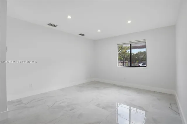 an empty room with a window