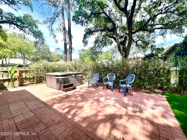 a view of a outdoor with a sitting area and fire pit