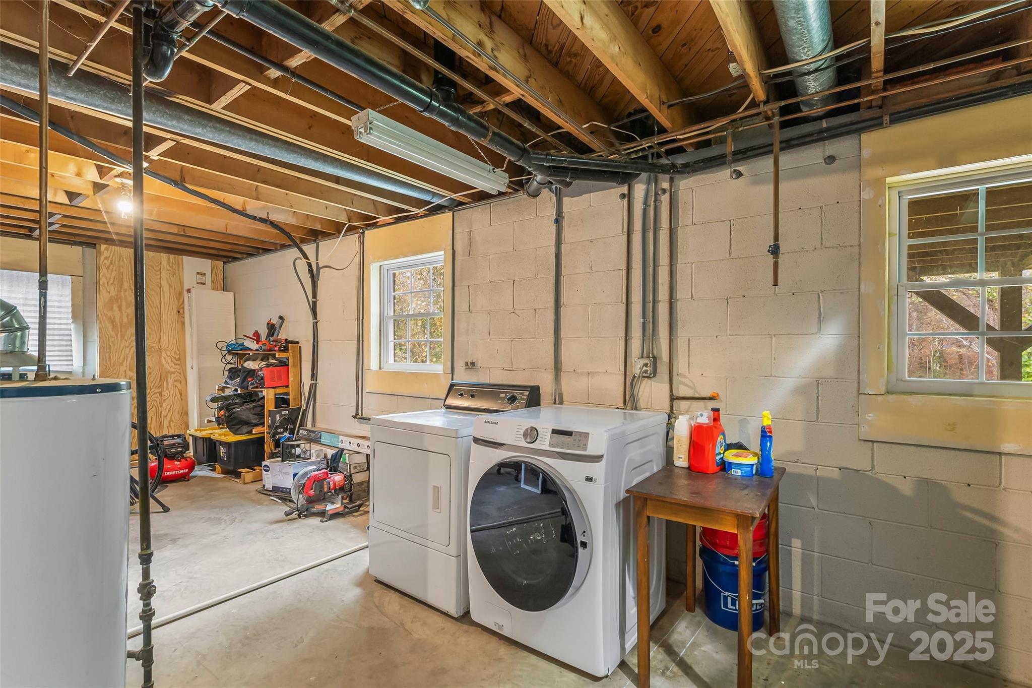 320 Morehead St Extension Morganton, NC 28655 - Photo 21 of 33 a utility room with dryer and washer