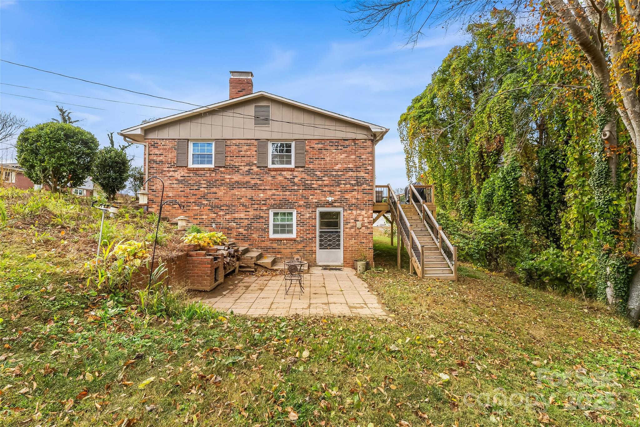 320 Morehead St Extension Morganton, NC 28655 - Photo 27 of 33 a view of a house with a yard