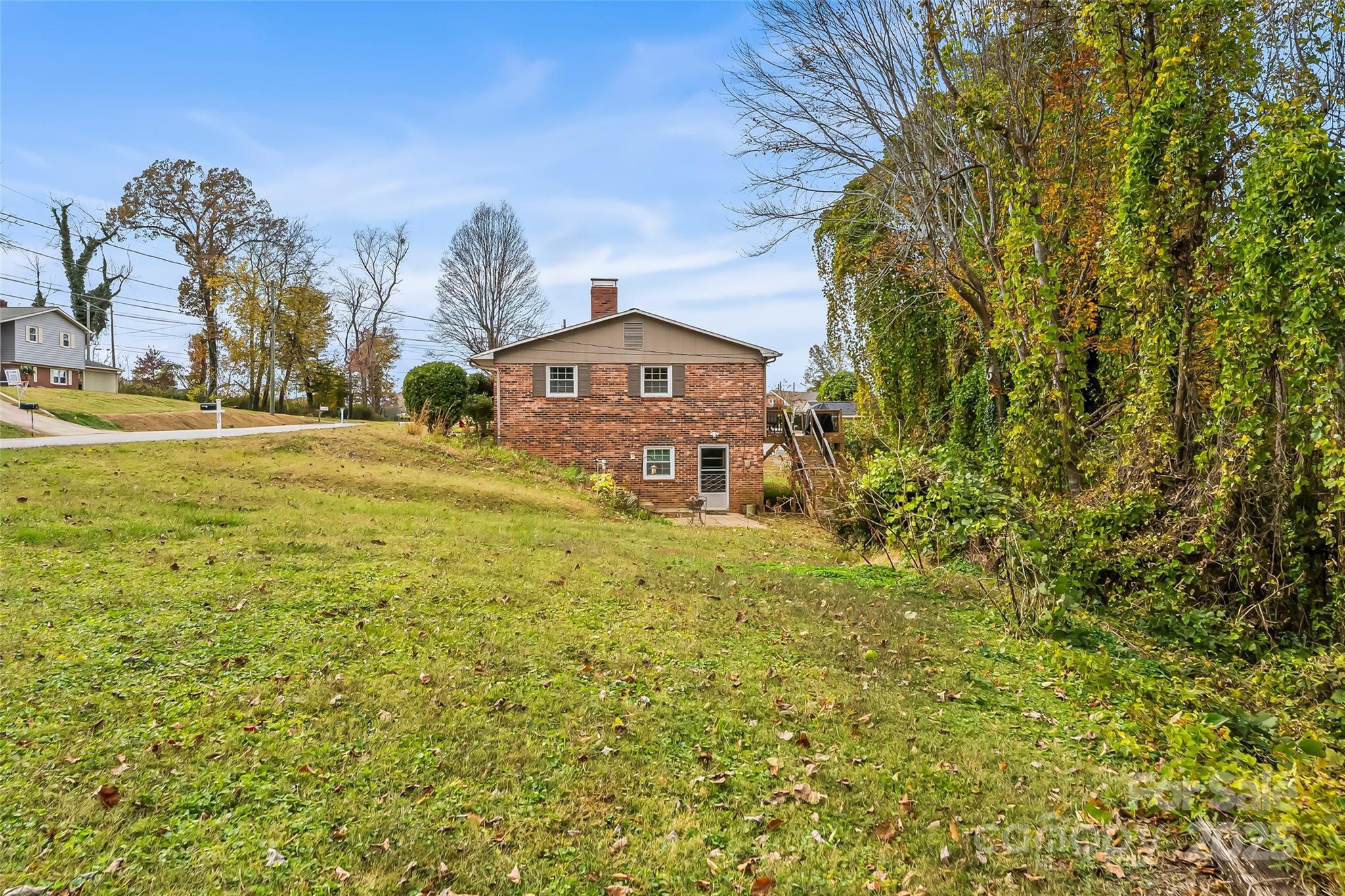 320 Morehead St Extension Morganton, NC 28655 - Photo 29 of 33 a view of a big yard with large trees