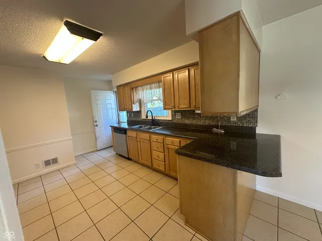 $211,750 | 5105 South Breezewood Drive, Muncie, IN 47302