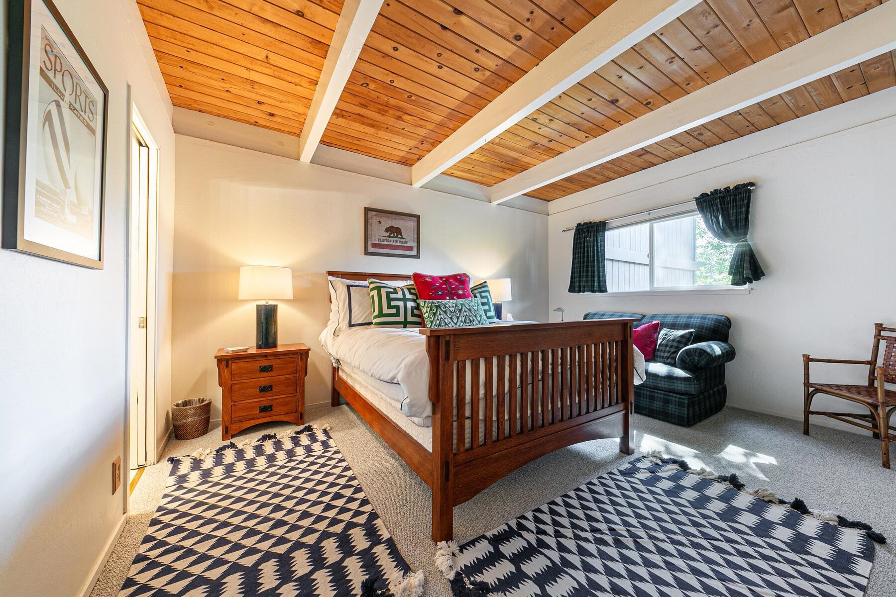 2560 Lake Forest Road, Unit 48 Tahoe City, CA 96145 - Photo 13 of 28 a bedroom with furniture