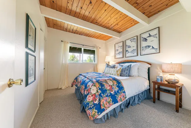 a view of a swimming pool with an outdoor space and seating area