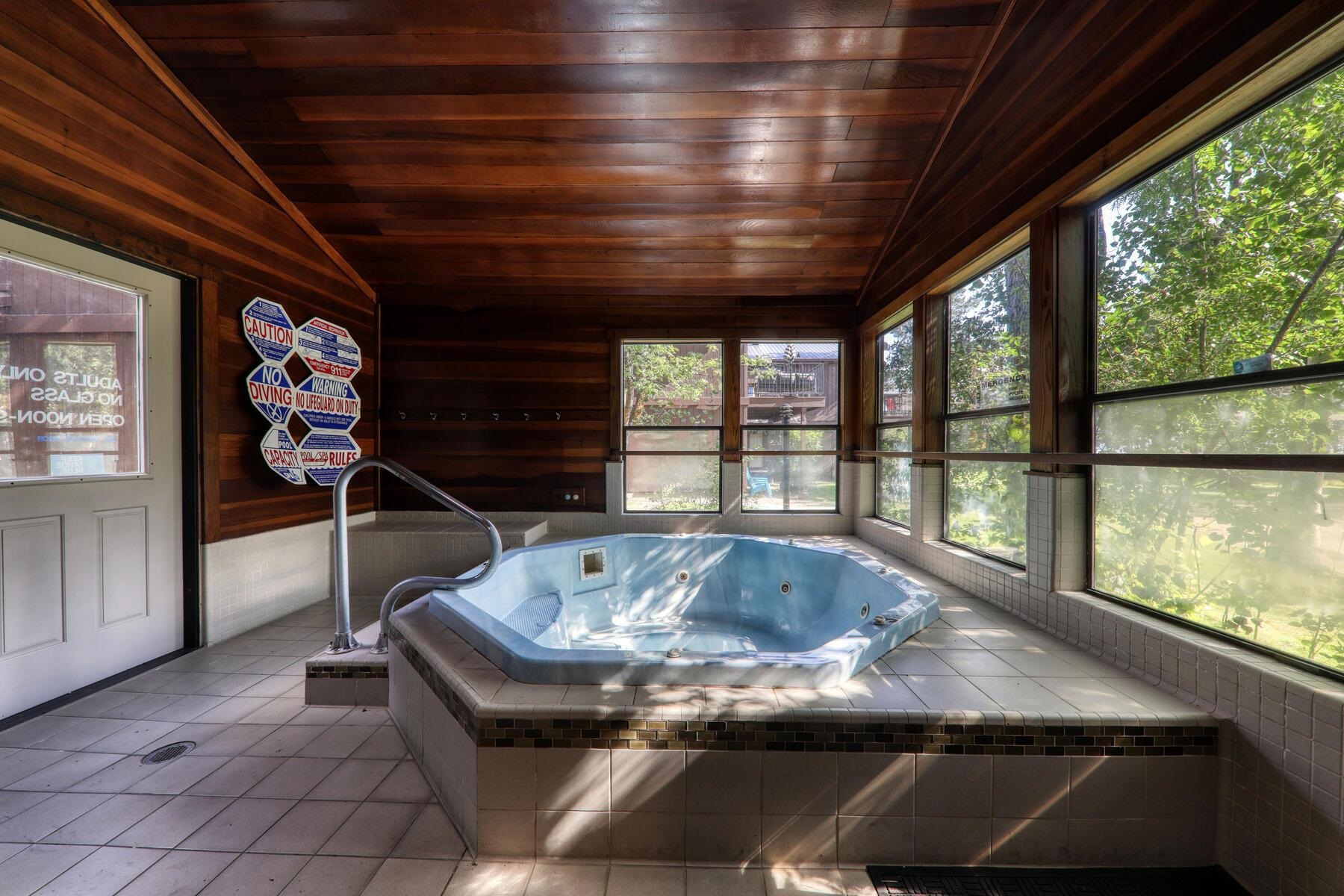 2560 Lake Forest Road, Unit 48 Tahoe City, CA 96145 - Photo 24 of 28 a view of jacuzzi with couch