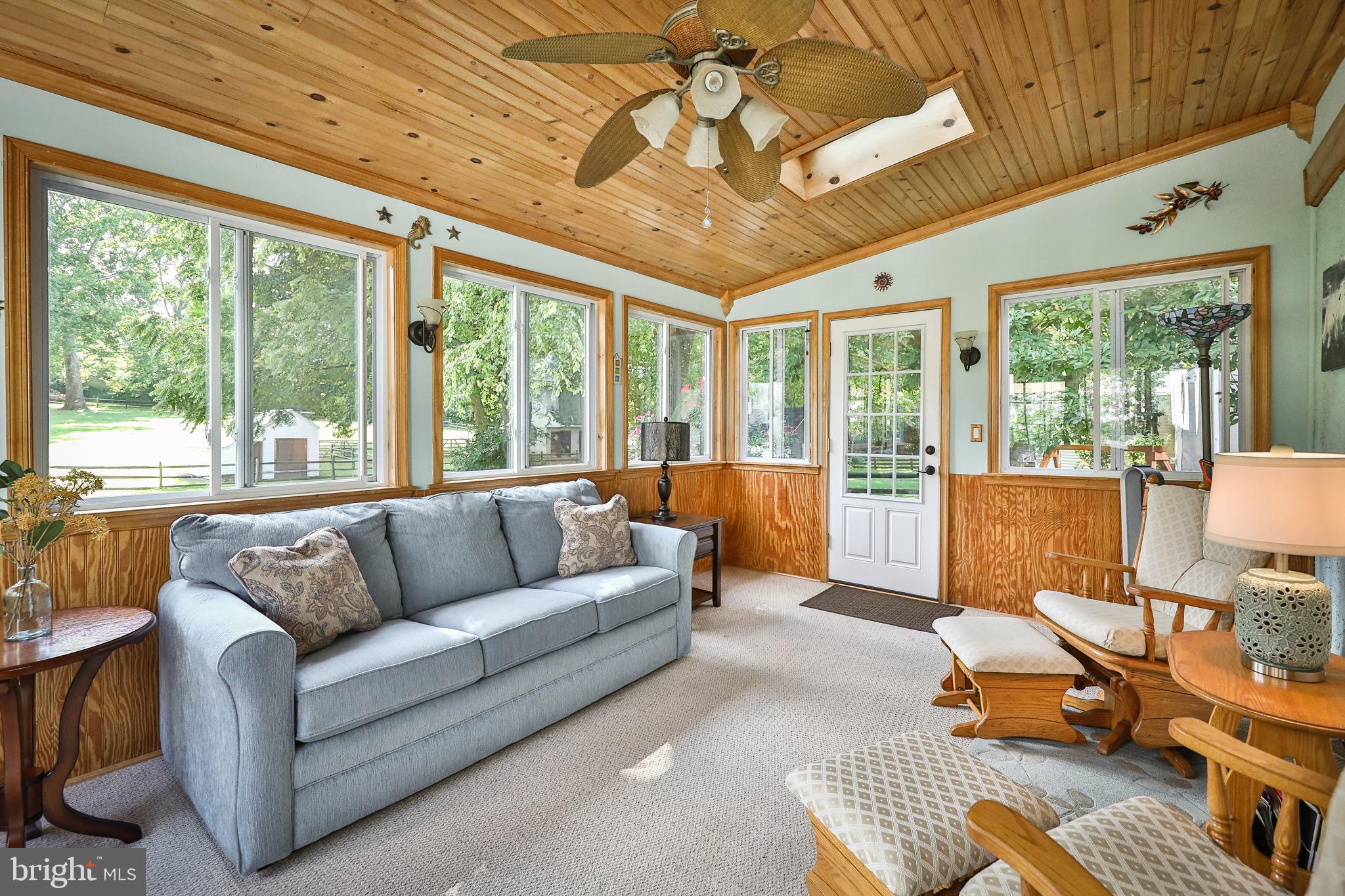 1702 Church Road Oreland, PA 19075 - Photo 14 of 28 a living room with furniture and a large window