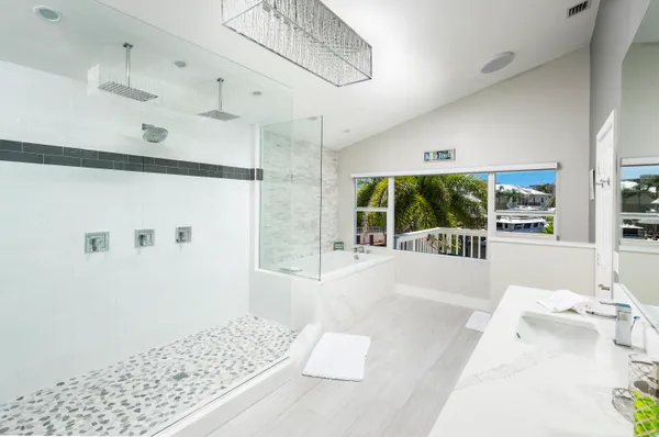 a swimming pool with outdoor seating and yard