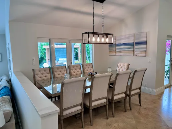 a bathroom with a sink mirror and toilet