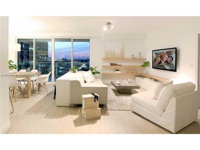 1250 South Miami Avenue, Unit 901 Miami, FL 33130 - Photo 2 of 10 a living room with furniture and large window