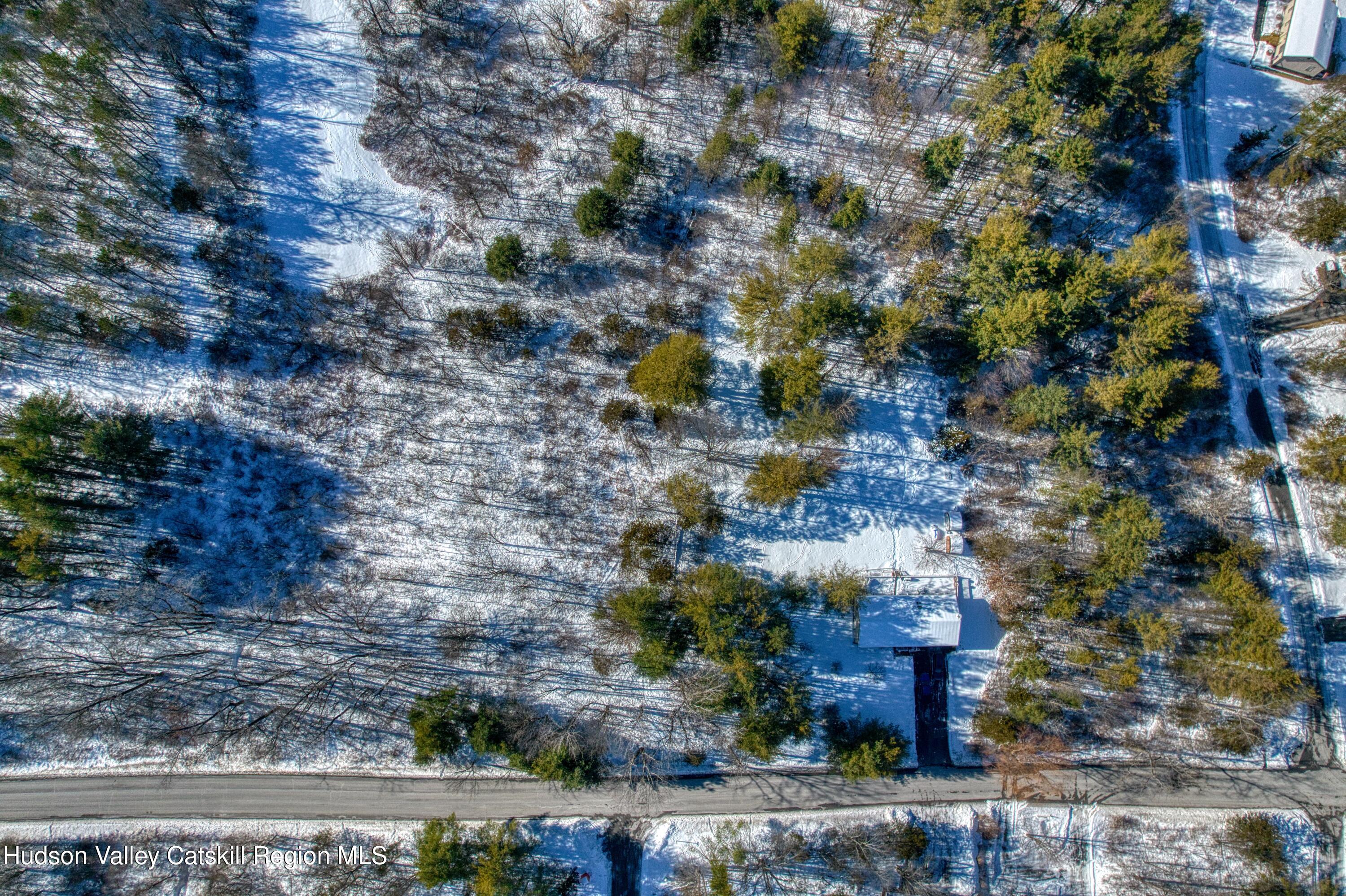 1178 Sleepy Hollow Road Athens, NY 12015 - Photo 4 of 11 an aerial view of a house with a yard