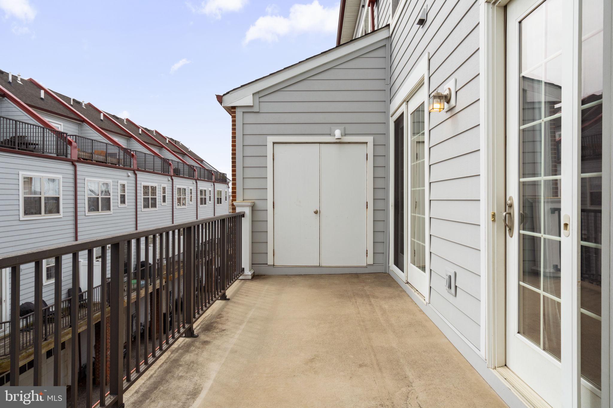 305 Captains Way Philadelphia, PA 19146 - Photo 29 of 63 a view of a balcony with wooden floor and fence