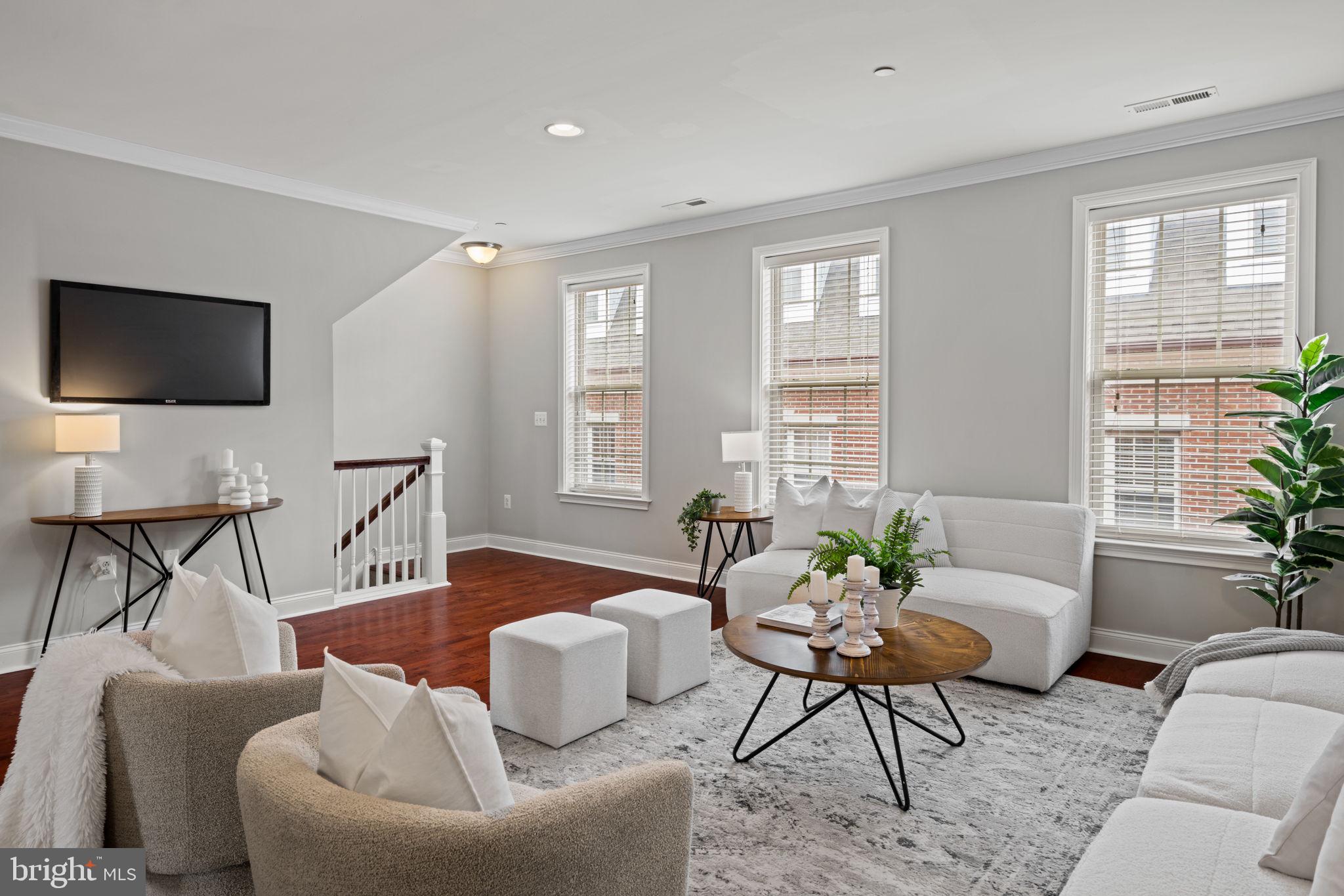 305 Captains Way Philadelphia, PA 19146 - Photo 3 of 63 a living room with furniture and a flat screen tv