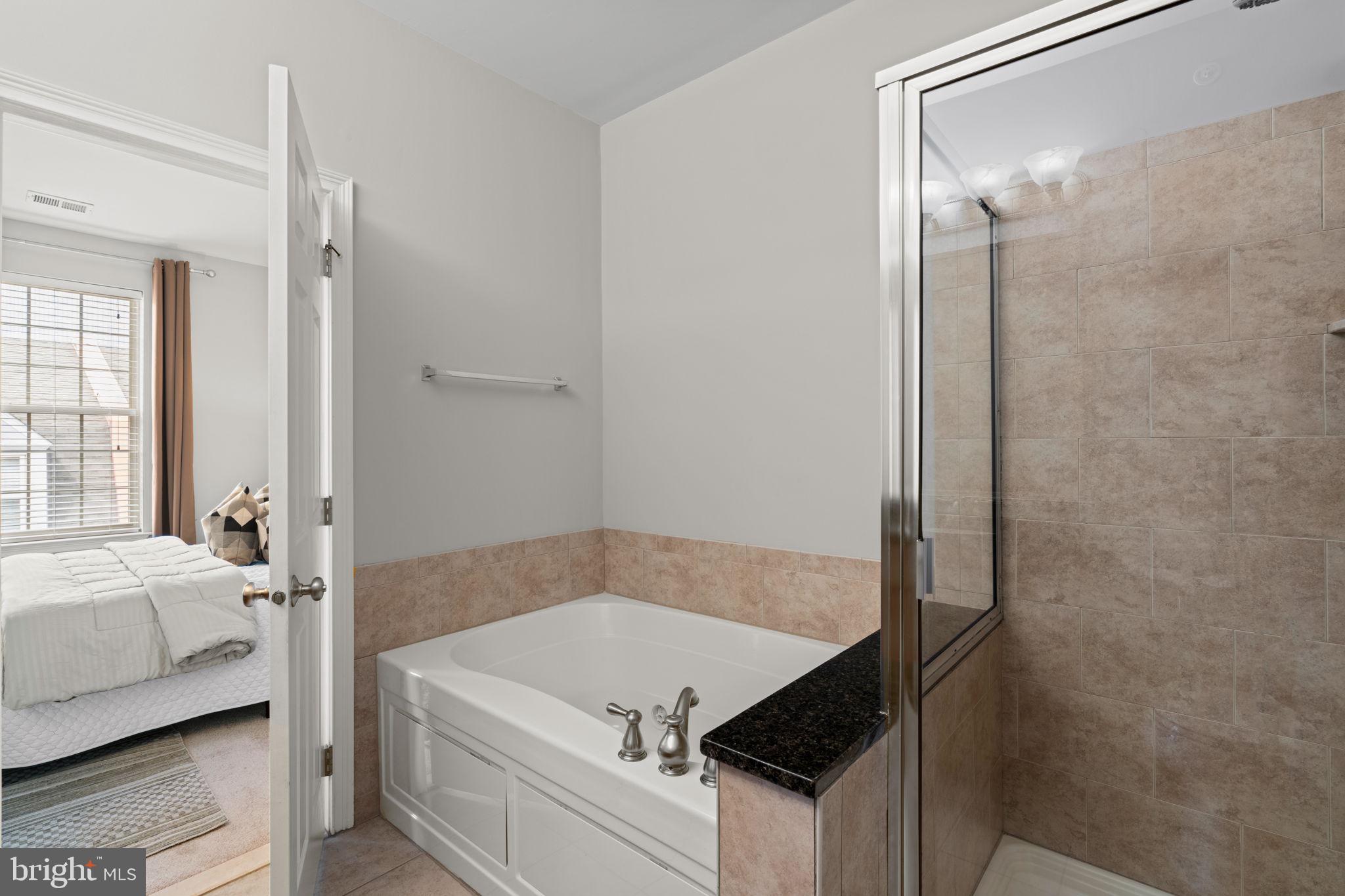 305 Captains Way Philadelphia, PA 19146 - Photo 36 of 63 a bathroom with a tub and a sink