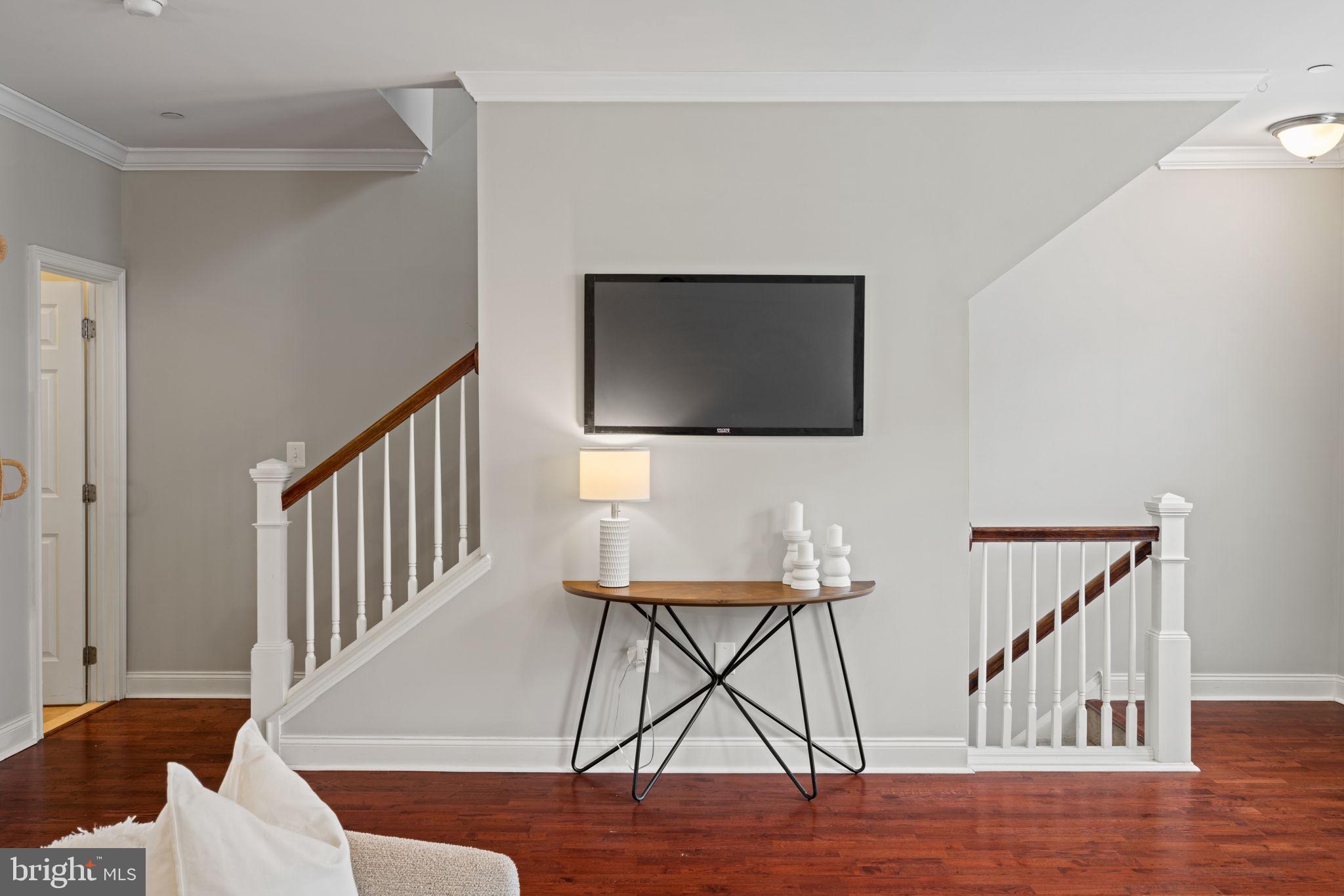 305 Captains Way Philadelphia, PA 19146 - Photo 6 of 63 a living room with furniture and a flat screen tv