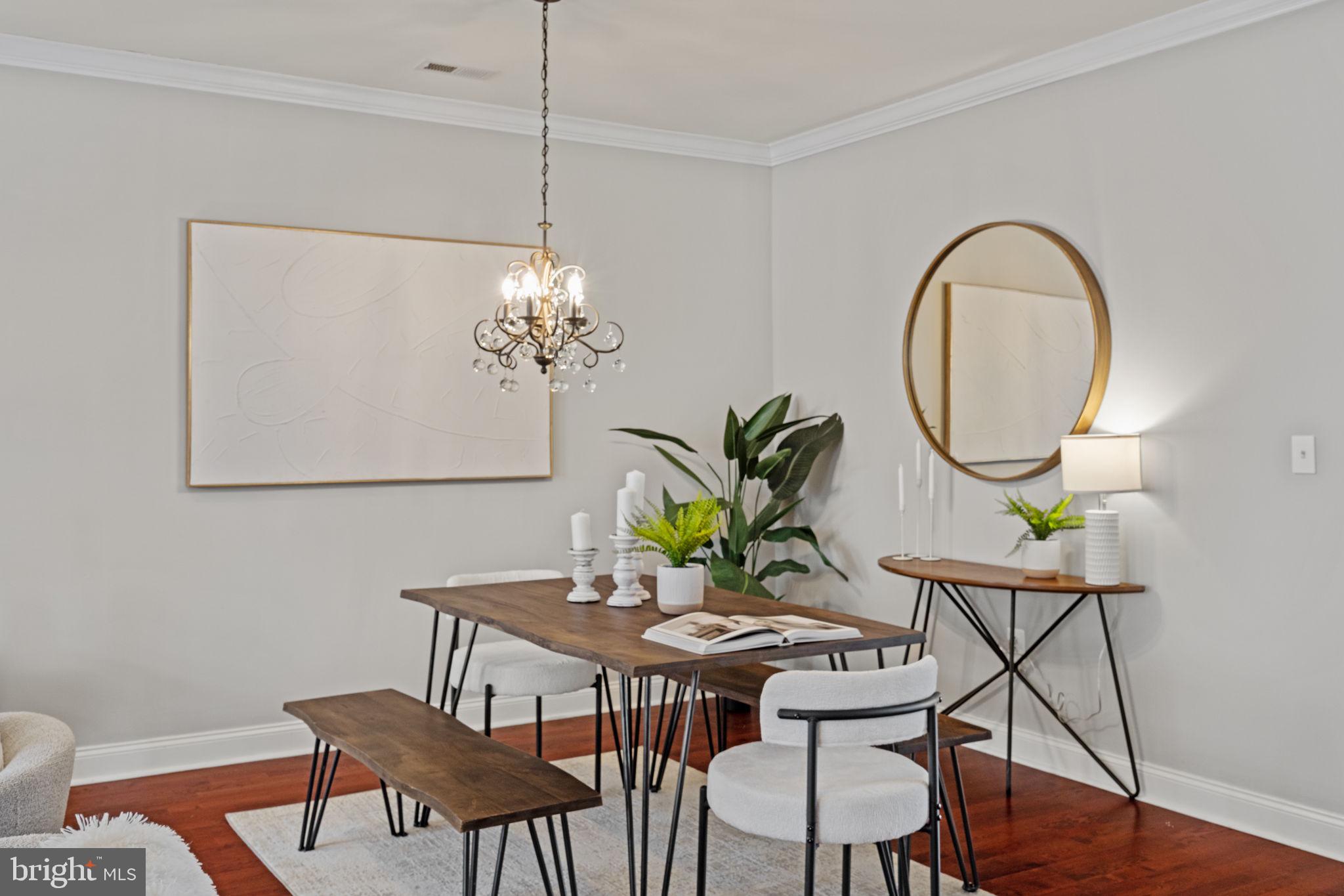 305 Captains Way Philadelphia, PA 19146 - Photo 10 of 63 a view of a dining room with furniture and wooden floor