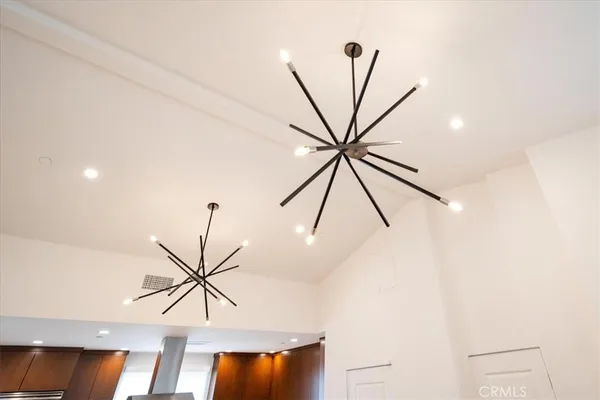 a roof deck with table and chairs