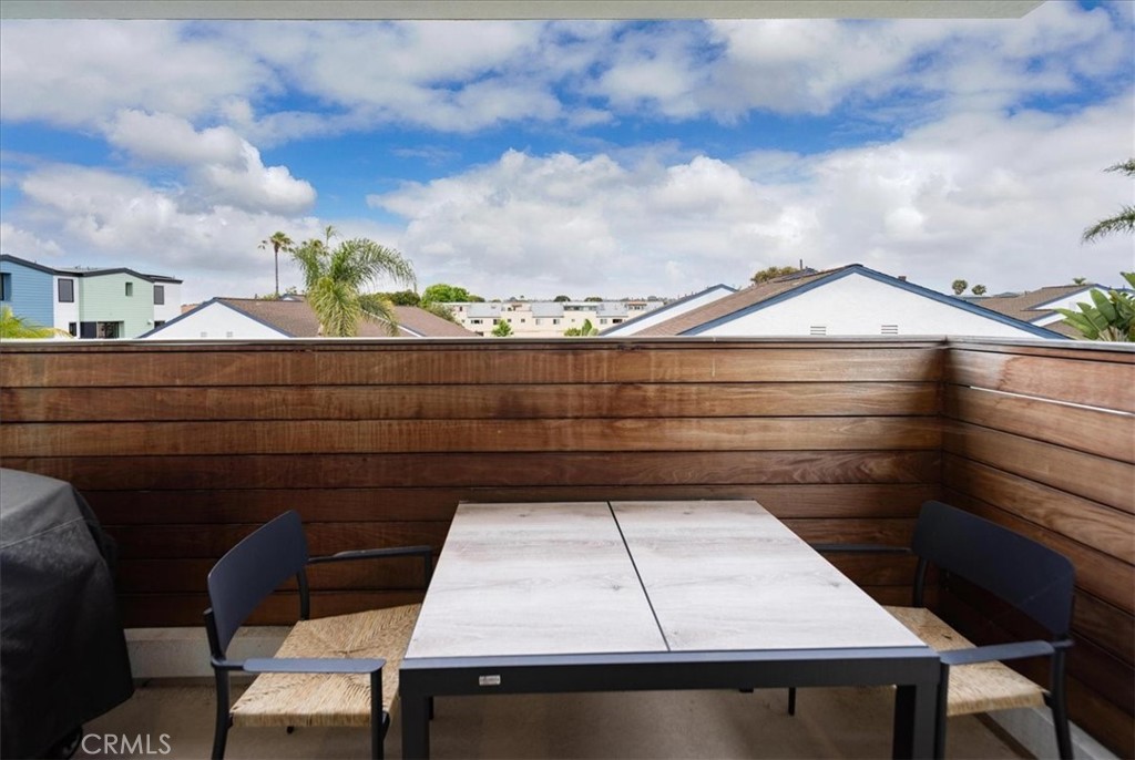 3632 Garfield Street Carlsbad, CA 92008 - Photo 18 of 50 a roof deck with table and chairs