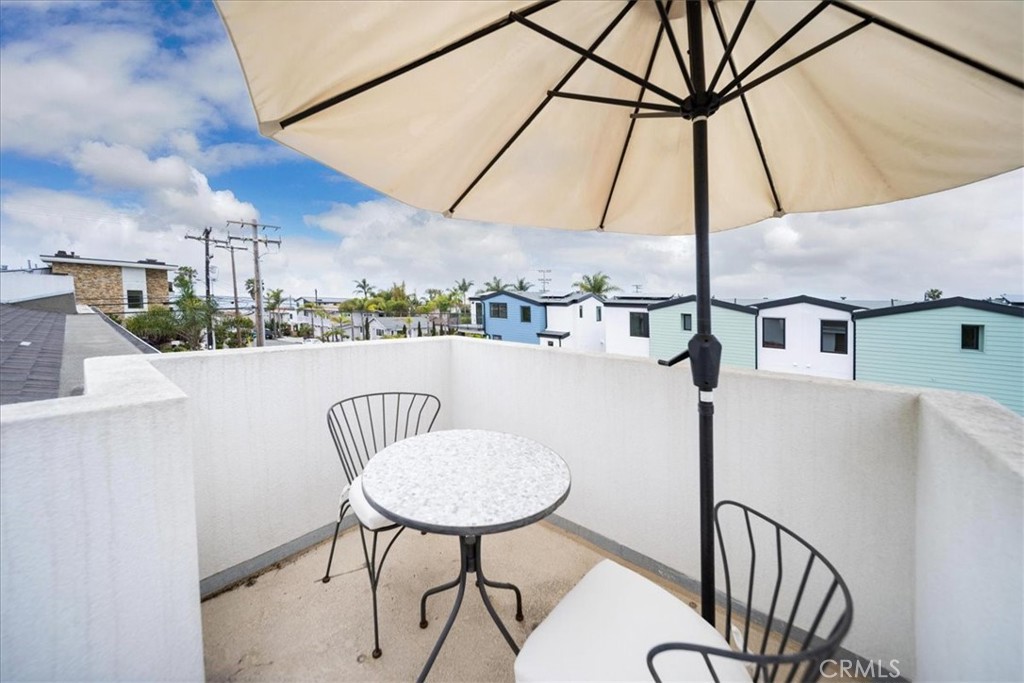3632 Garfield Street Carlsbad, CA 92008 - Photo 22 of 50 a table and chairs in the patio