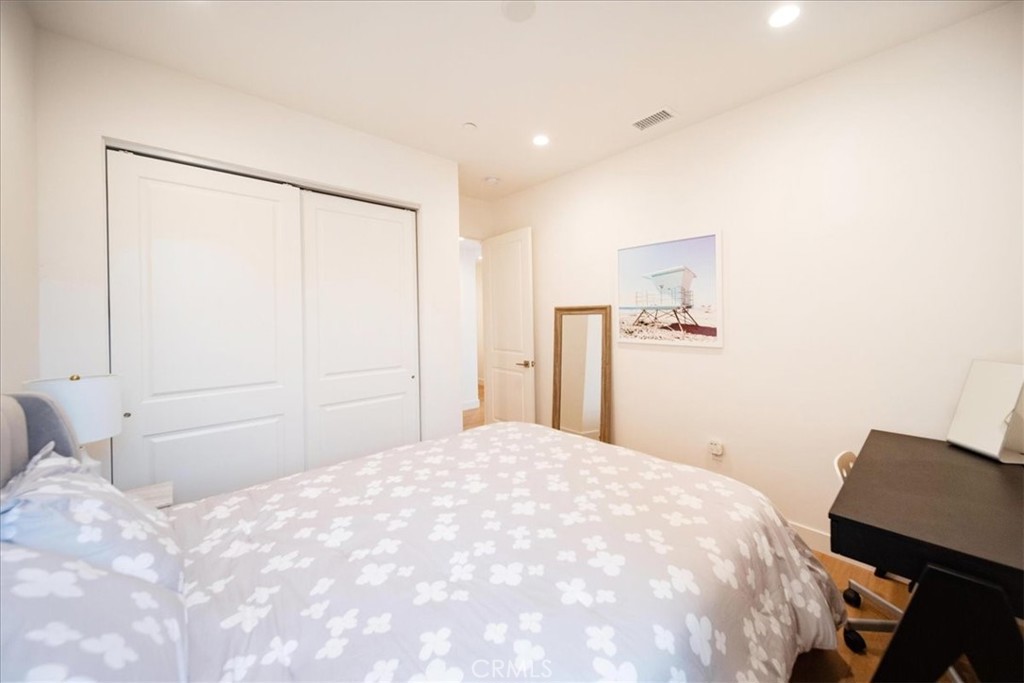 3632 Garfield Street Carlsbad, CA 92008 - Photo 29 of 50 a large white bed in a white room