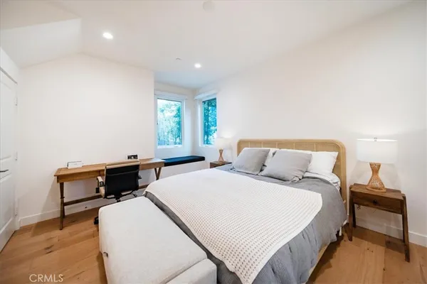 a bedroom with a bed and furniture