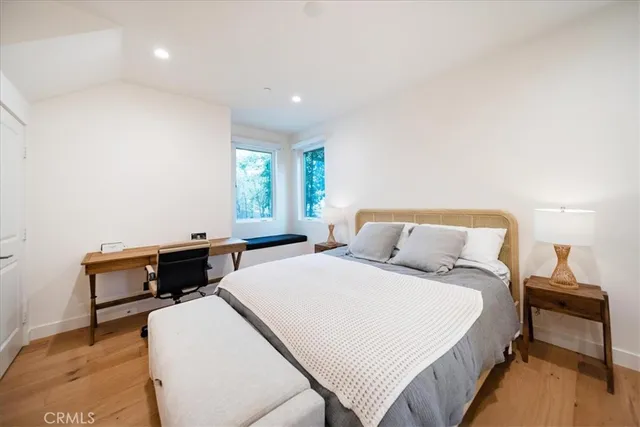 a bedroom with a bed and furniture