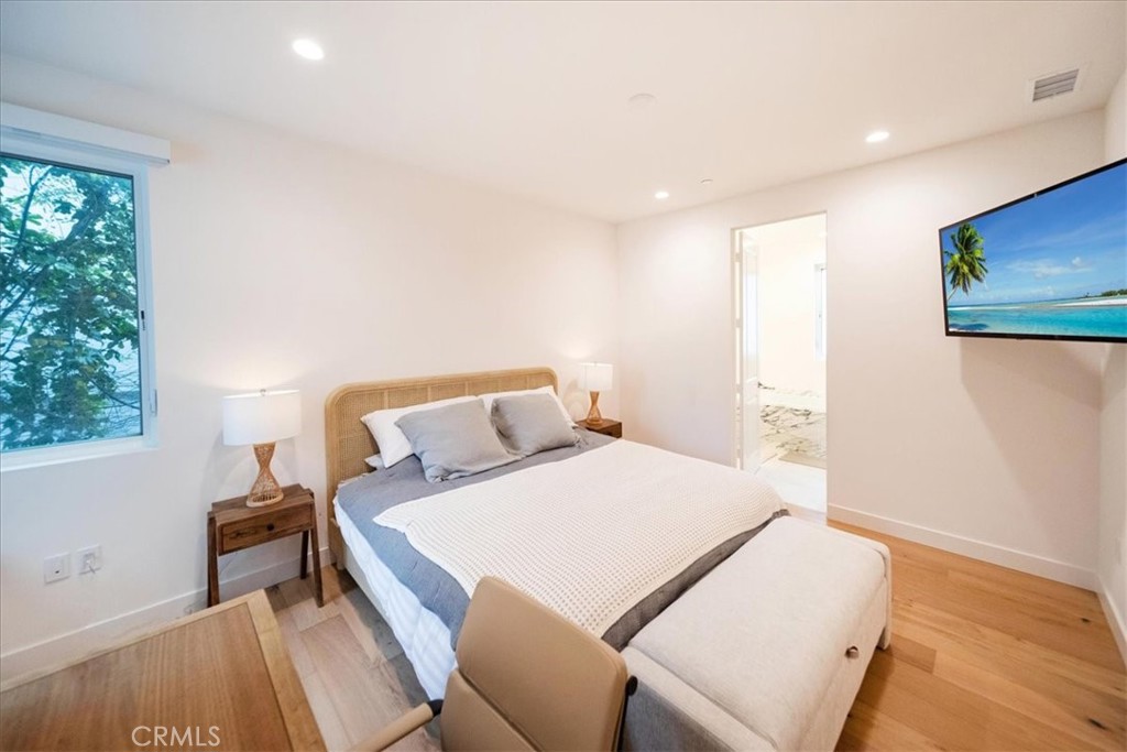 3632 Garfield Street Carlsbad, CA 92008 - Photo 35 of 50 a bedroom with a bed and a window