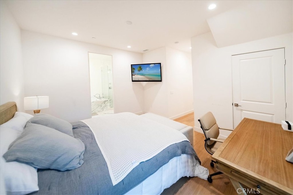 3632 Garfield Street Carlsbad, CA 92008 - Photo 36 of 50 a bedroom with a bed and furniture