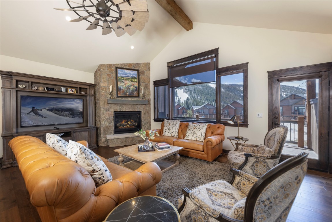 58 Erickson Loop, Unit 13A Keystone, CO 80435 - Photo 1 of 28 a living room with furniture large window and a fireplace