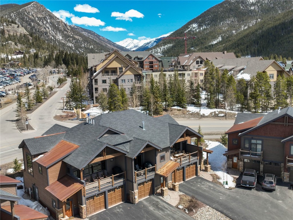 58 Erickson Loop, Unit 13A Keystone, CO 80435 - Photo 12 of 28 a view of a patio with table and chairs and potted plants