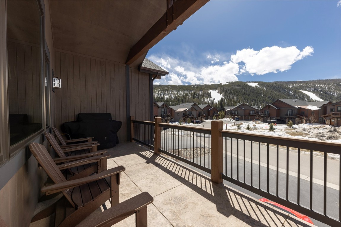 58 Erickson Loop, Unit 13A Keystone, CO 80435 - Photo 13 of 28 a view of a balcony with wooden floor