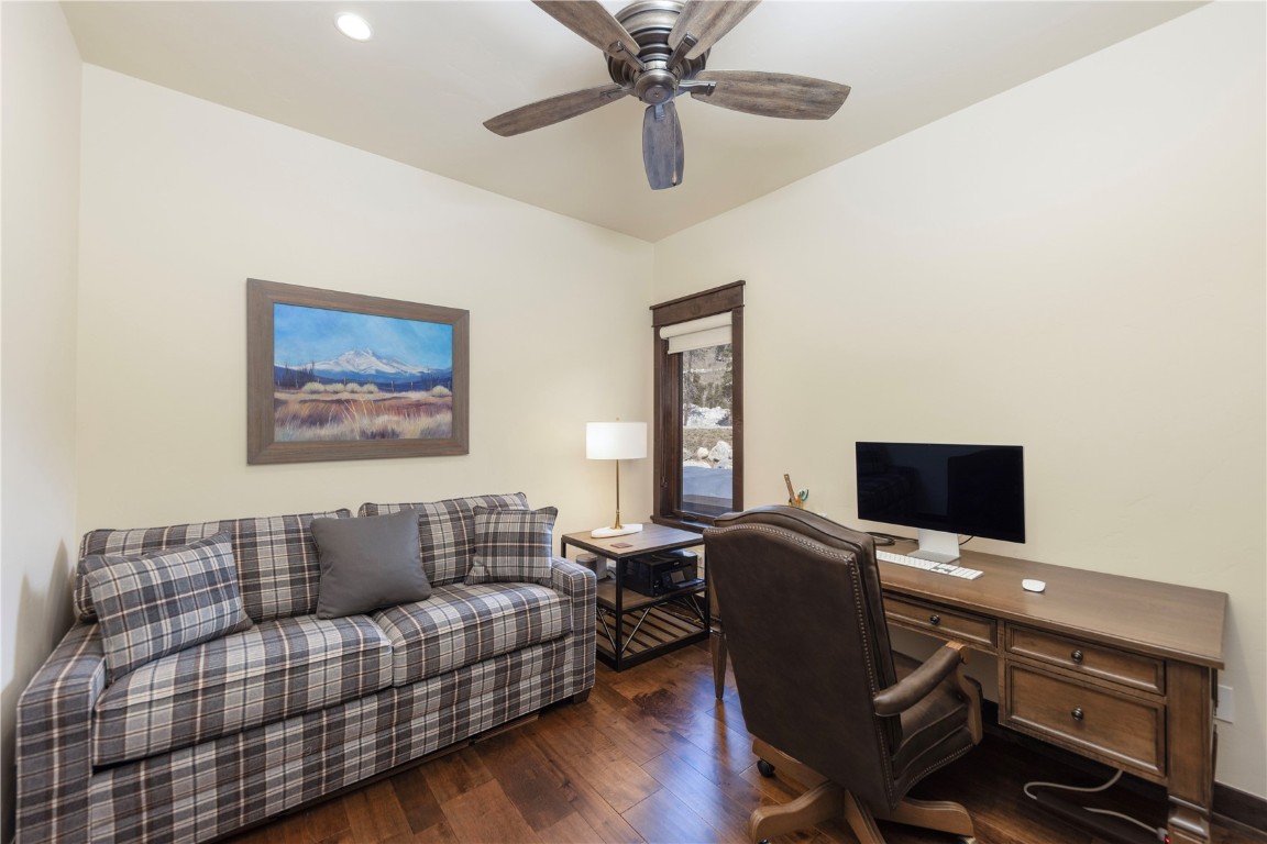 58 Erickson Loop, Unit 13A Keystone, CO 80435 - Photo 16 of 28 a living room with furniture a flat screen tv and a window