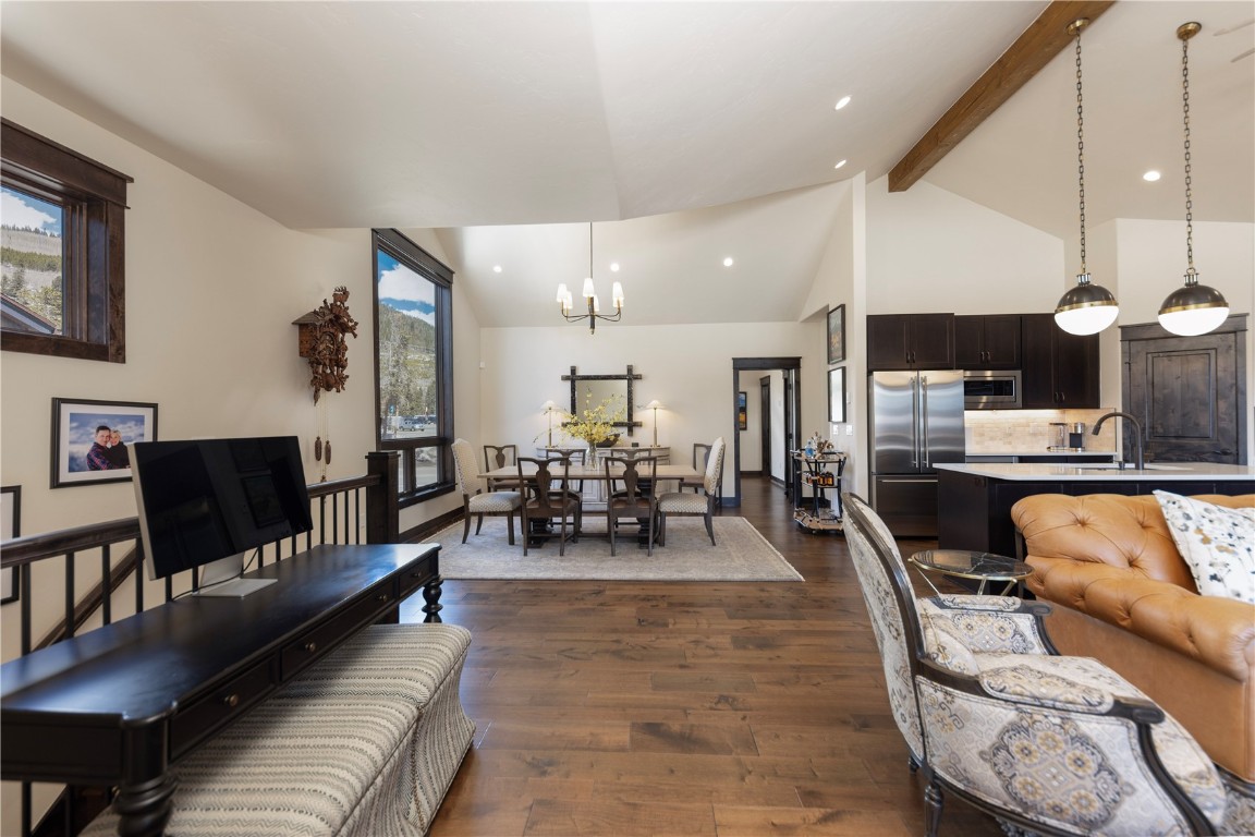 58 Erickson Loop, Unit 13A Keystone, CO 80435 - Photo 6 of 28 a living room with furniture and kitchen view